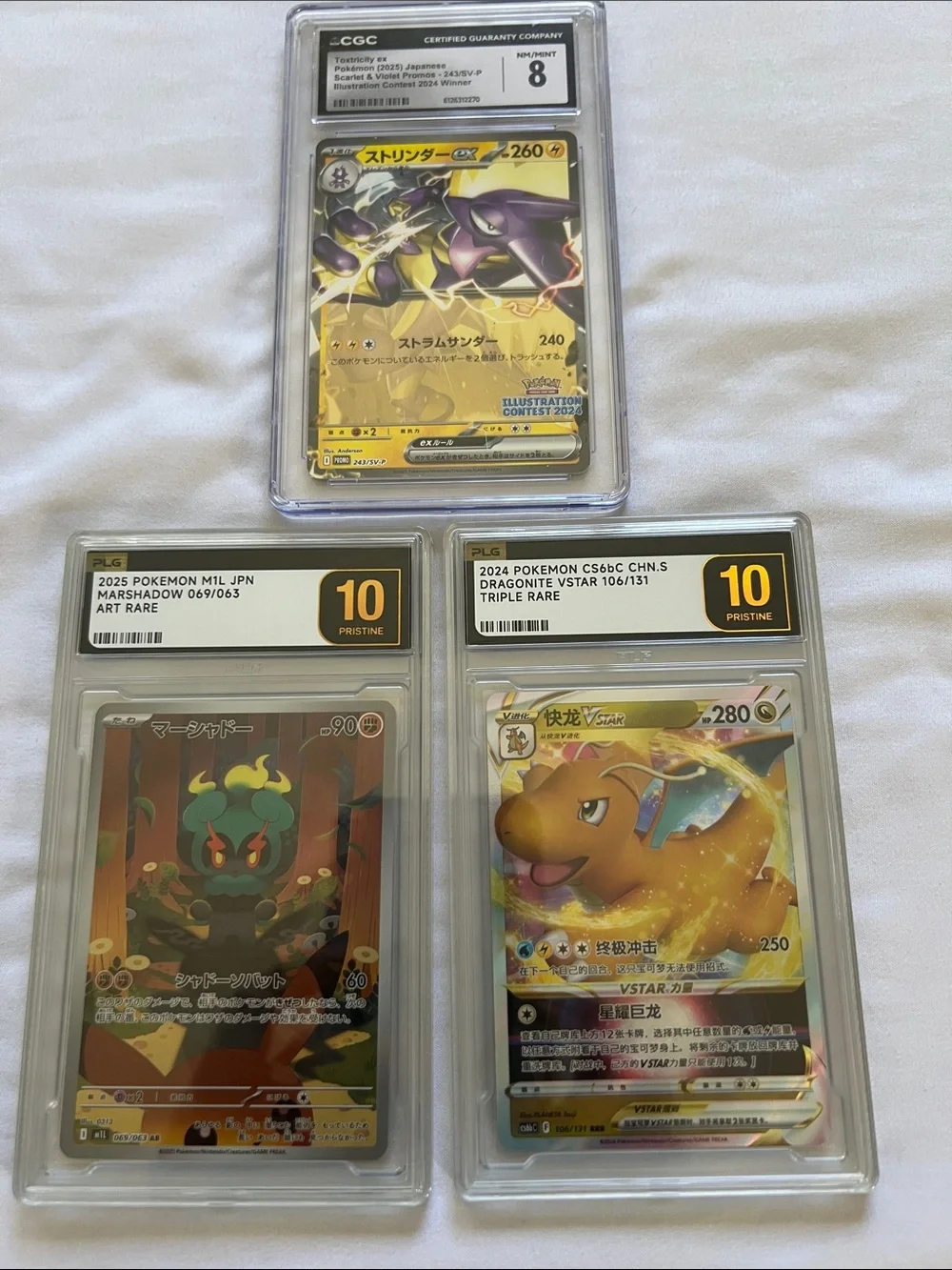 Pokemon Graded Trading Cards — Gold, Black and Purple Accents
